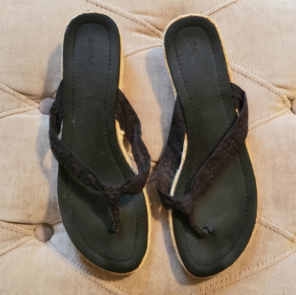 black cloth flip flops